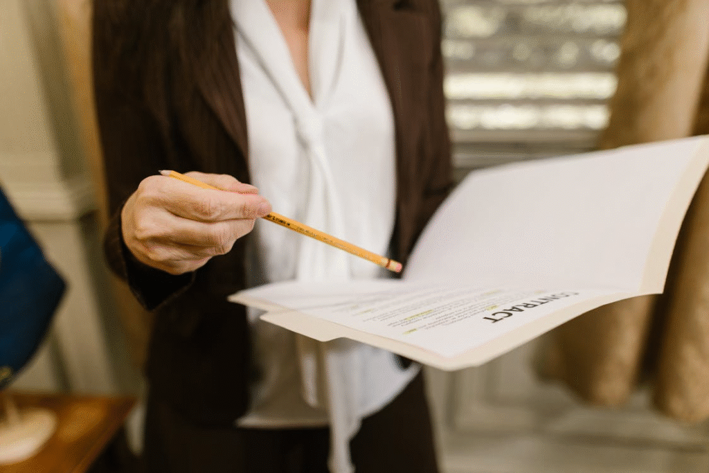 a person holding a document.