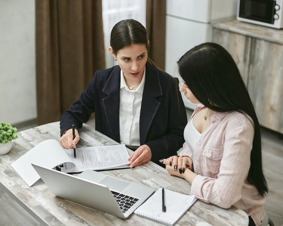 two women having a discussion.