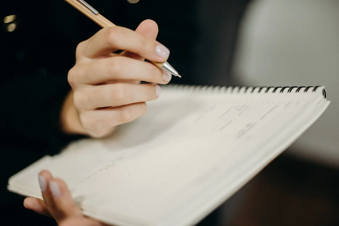  person-taking-notes