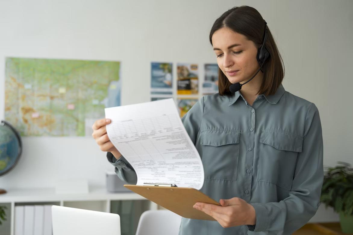 Businesswoman reviewing IT outsourcing contracts to address legal risks